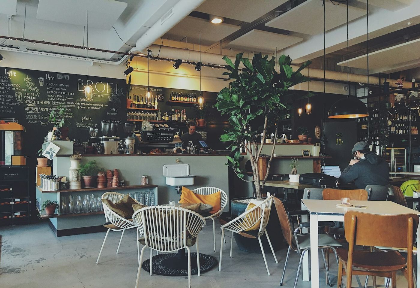 Rattan chairs and timber tables at The Outlook Cafe